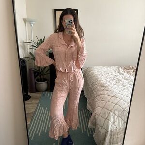 Anthropologie pink pajama set with flare details - size small